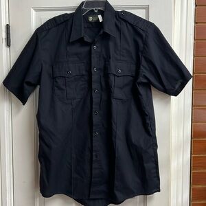NWOT Blue uniform with shirt with short sleeves. Collar and button down front.